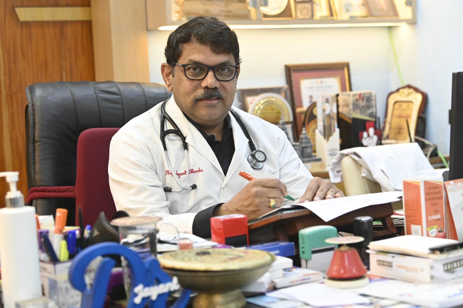 Dr Jayanta K. Panda in consultation setting