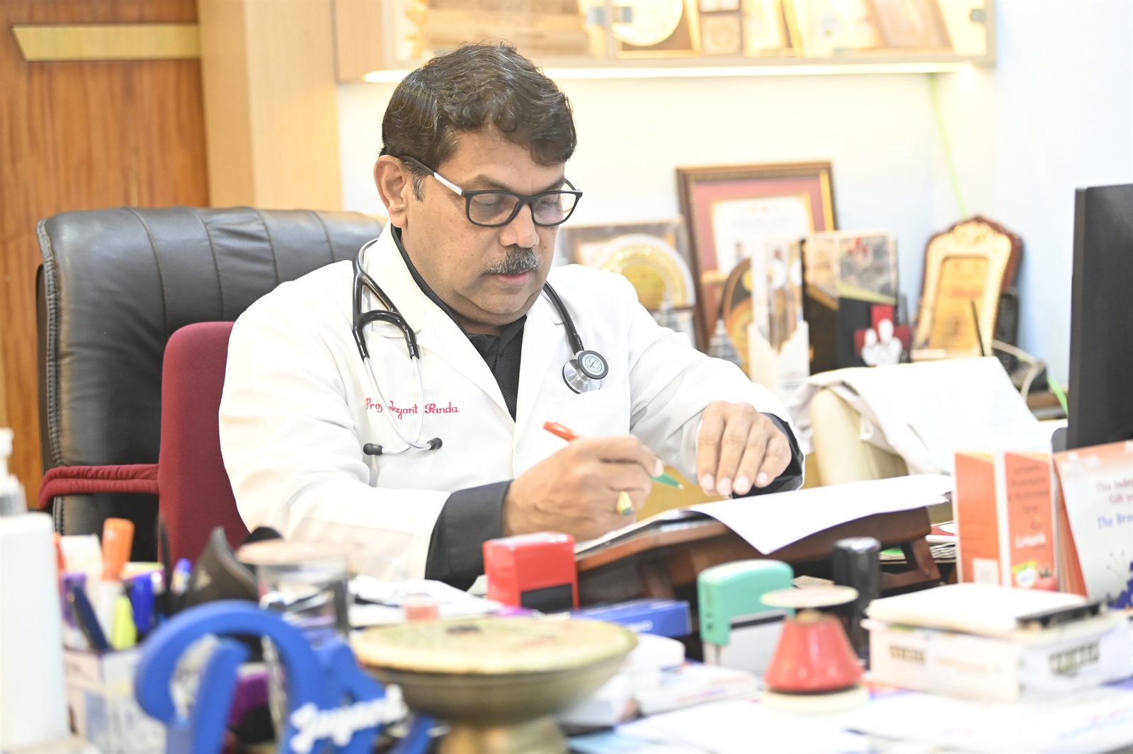 Dr Jayanta K. Panda at his clinic desk